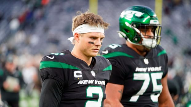 Jets QB Zach Wilson walks off field